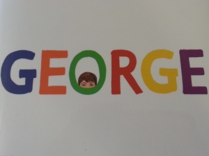 A white book cover with GEORGE in rainbow colors. A young girl peeks out through the O.